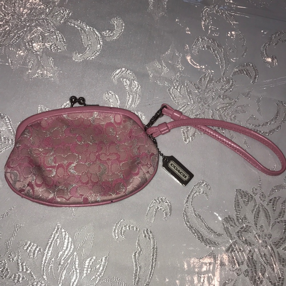 Pink change coach wristlet
